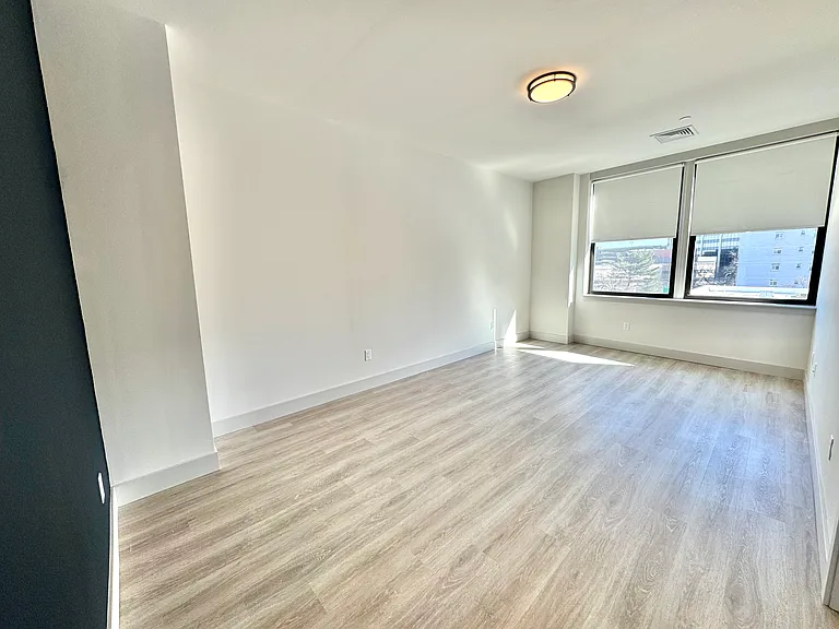 Residence 420 top floor faces south! Spacious living room