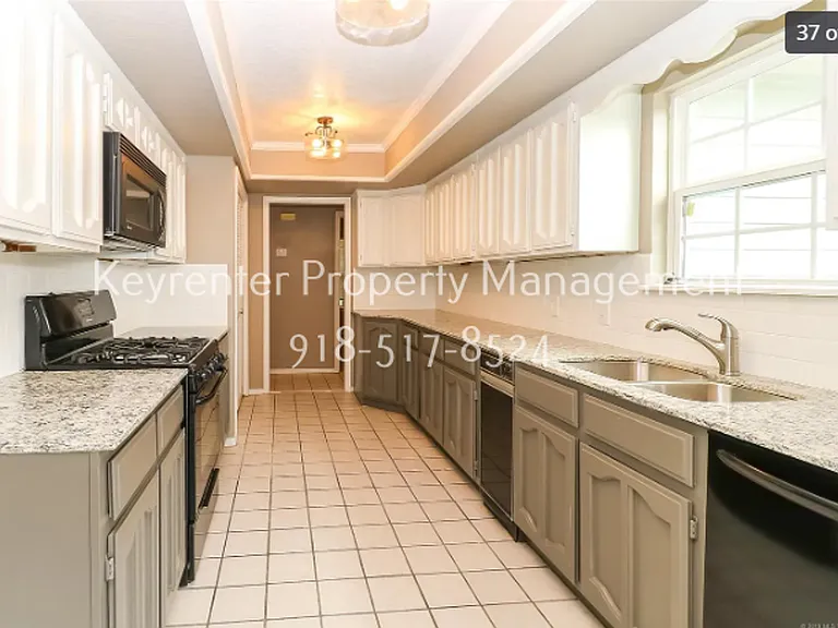 7737 S Trenton Ave — Photo 34