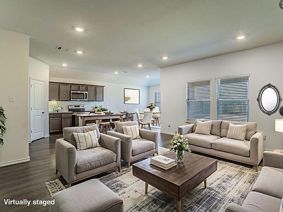 Open living, dining and kitchen area