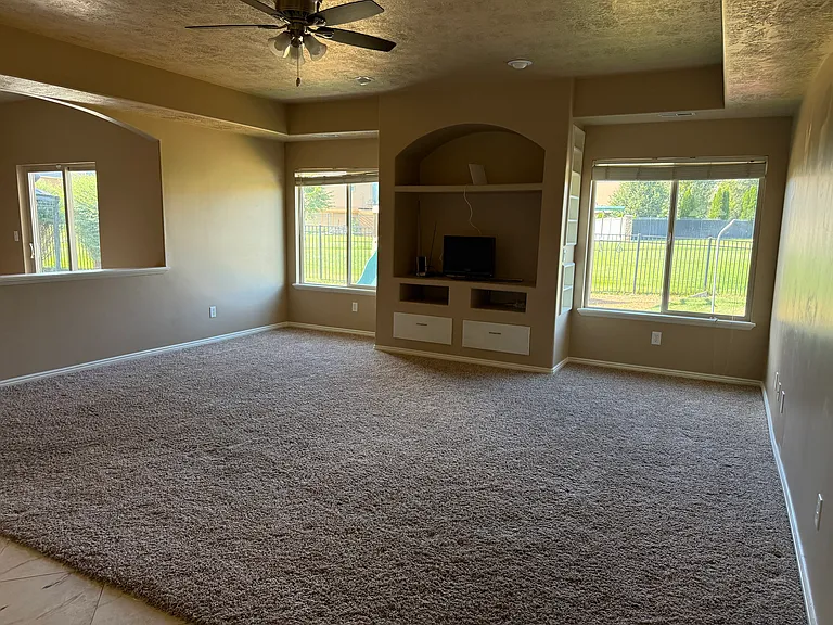 Family room Towards the Back Windows From the Foyer View