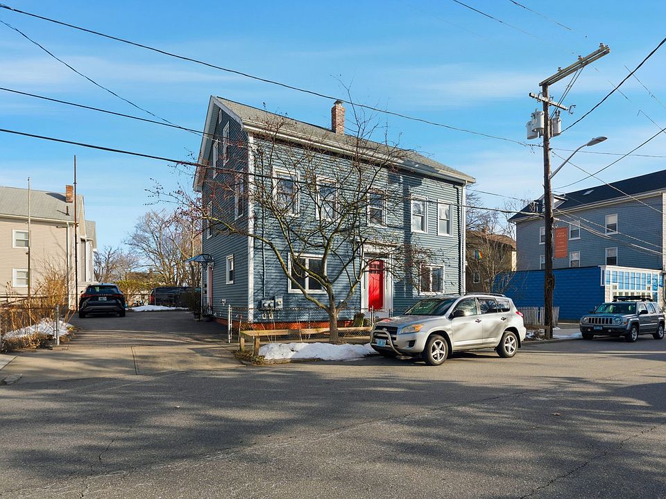 Front of the home and driveway viewed from Ives Street