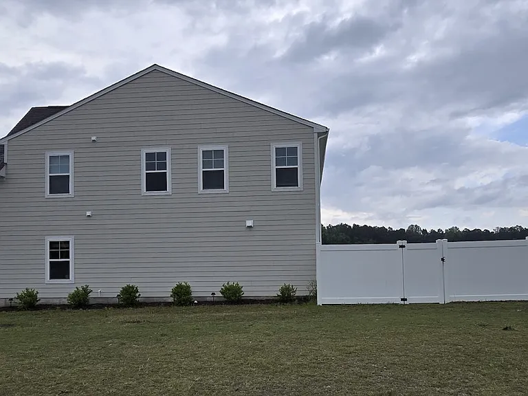 Side view, open to community entrance.