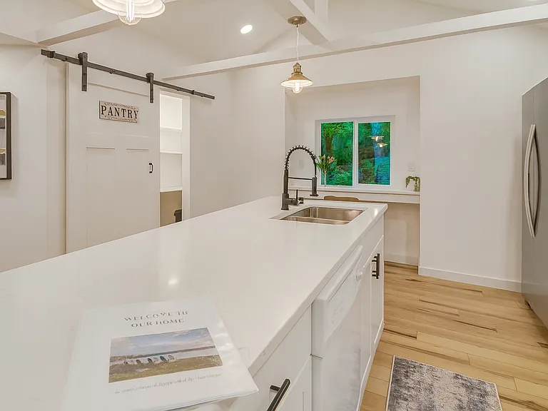A spacious kitchen island perfect for gathering, cooking, or simply enjoying a morning coffee