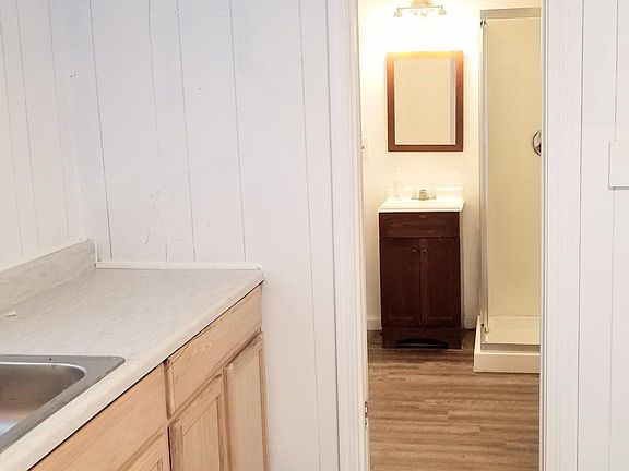 Kitchen/living area to bathroom