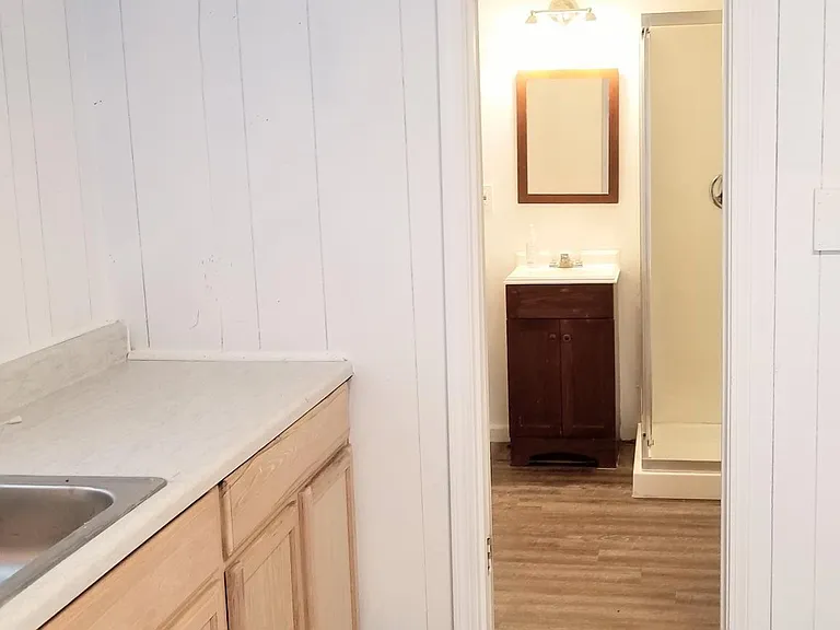 Kitchen/living area to bathroom
