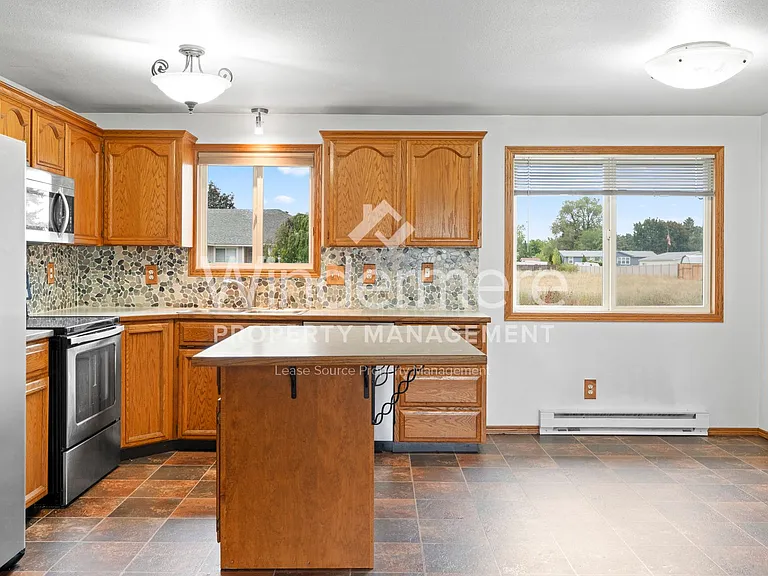 14920 E 14th Ave — Photo 17