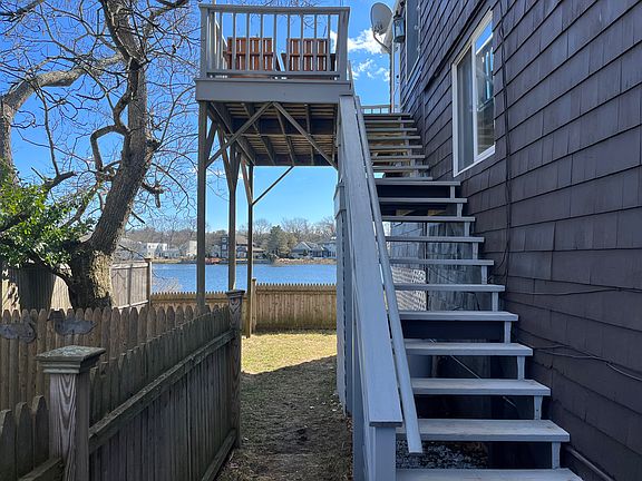 Stairs lead up to condo.