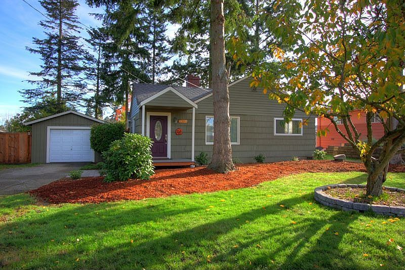 Nicely landscaped and painted home with detached garage.