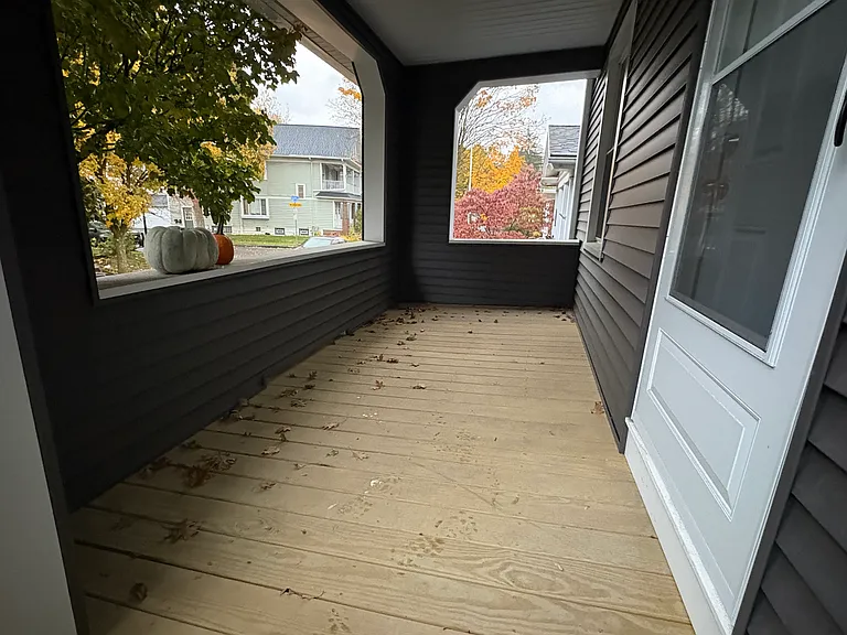 Another view of the new porch, which will be stained with a darker finish in the near future.
