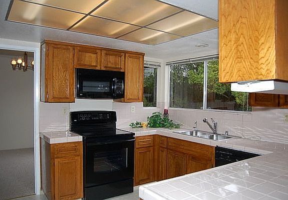 Kitchen with new appliance and floor