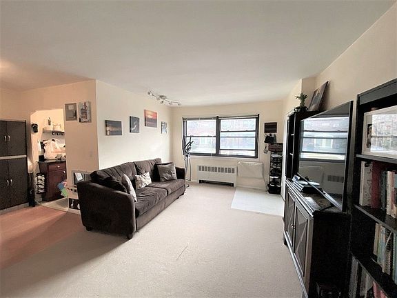 4th image of 245-59 62nd Ave #1