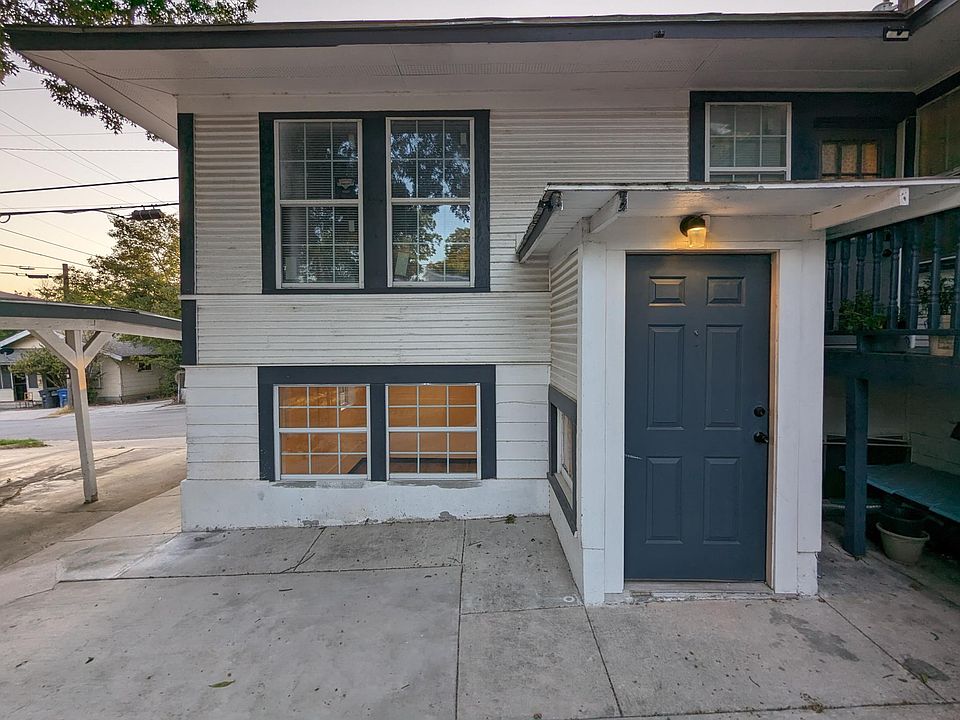 Entrance to apartment. Stairs lead down to studio.