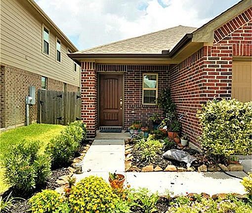 Lovely updated Landscaping welcomes you Home.