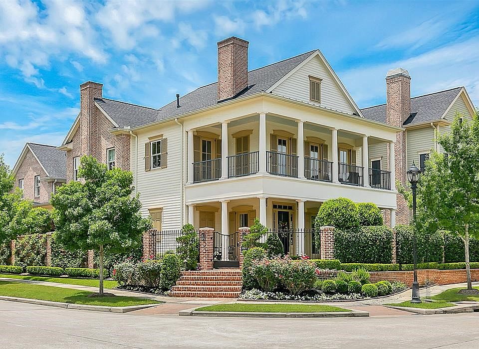 Impressive custom with true southern charm situated on premier corner of East Shore!