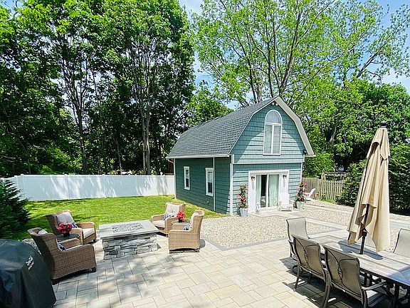 Back yard patio & pool house