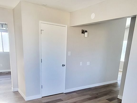 From kitchen sink looking onto walk-in pantry