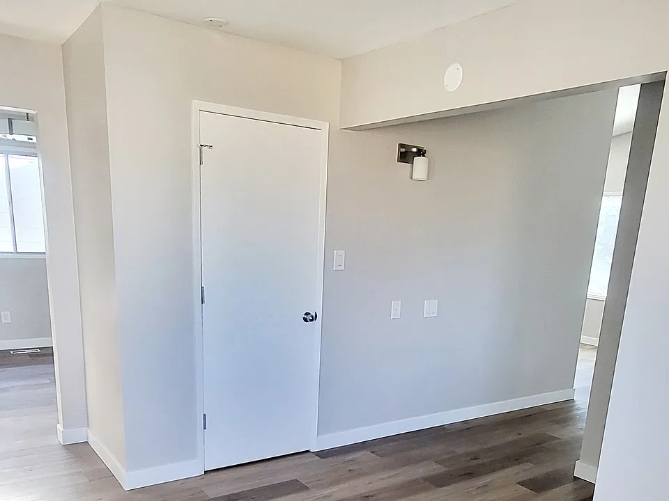 From kitchen sink looking onto walk-in pantry