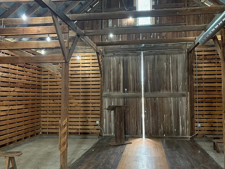The Chapel or meeting room behind the Lodge with podium
