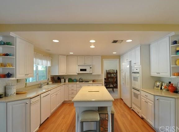 UPDATED KITCHEN WITH AN ISLAND