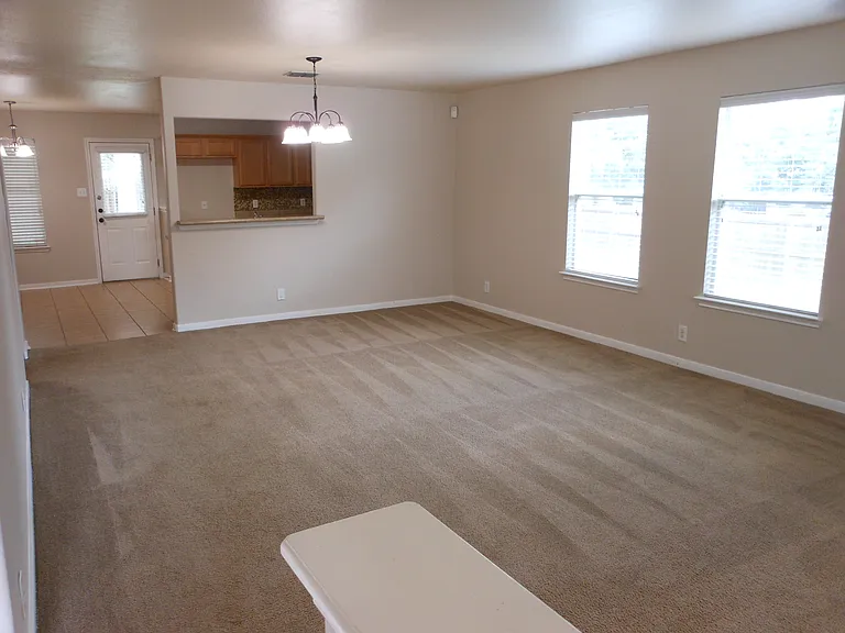 Downstairs Living and dining area, with kitchen and breakfast space and entry to backyard.