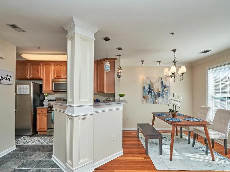 Tile in kitchen has been replaced to a beautiful white tile