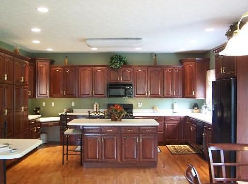 Kitchen: This kitchen is a must see! recessed lighting accent the cherry cabin