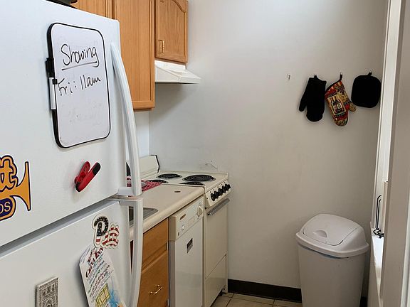 Galley kitchen with dishwasher