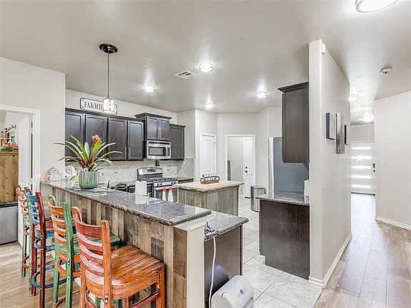 5th image of 9500 Squire Ln