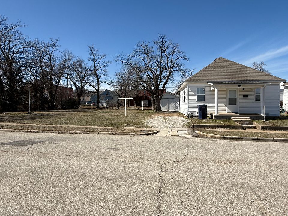 House with detached garage/storage and large lot
