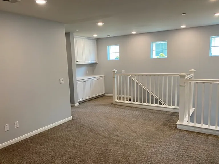 living area or family room at the top of the staircase