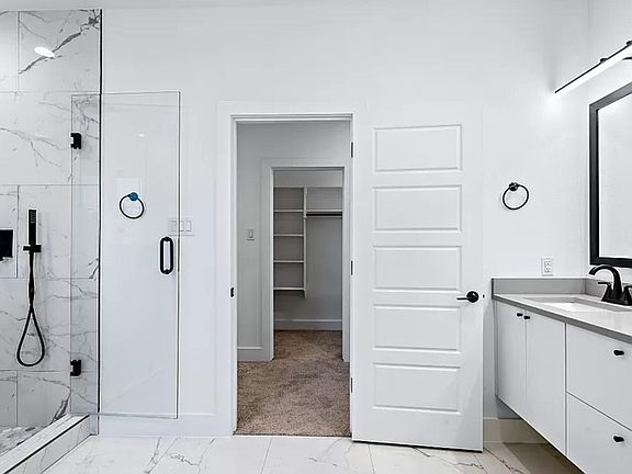 Primary bathroom - beautiful shower on left