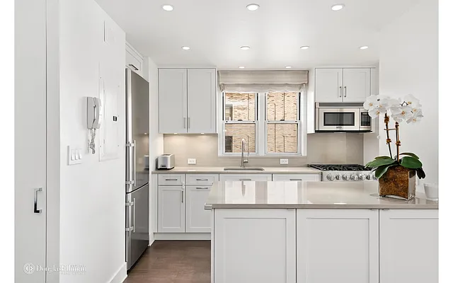 Sold by Douglas Elliman | media 13