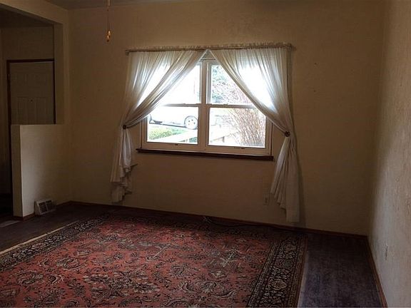 Living room with newer windows that provides plenty of natural light.