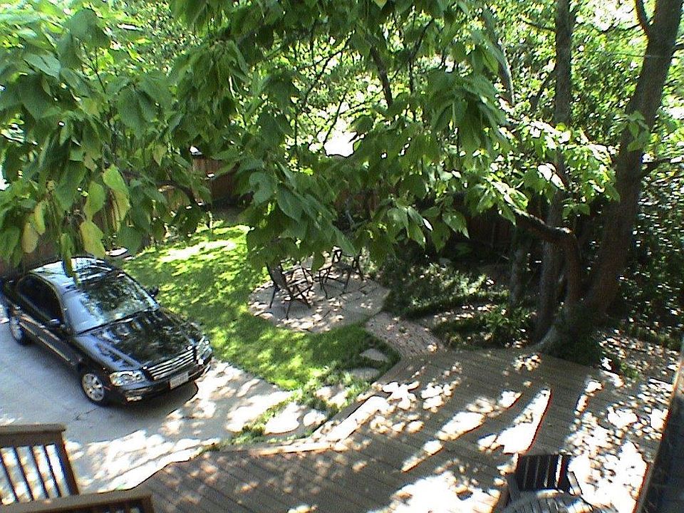 The backyard view from the upper redwood deck.