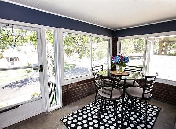 Peaceful glassed in porch