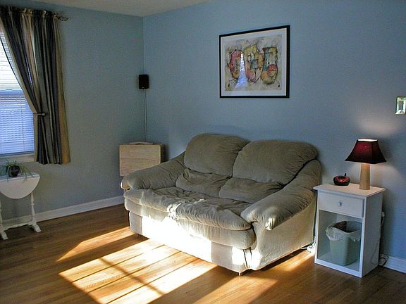 Spacious living room with hardwood floors
