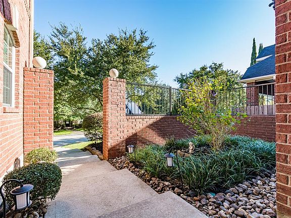 Peaceful courtyard with serene landscaping!