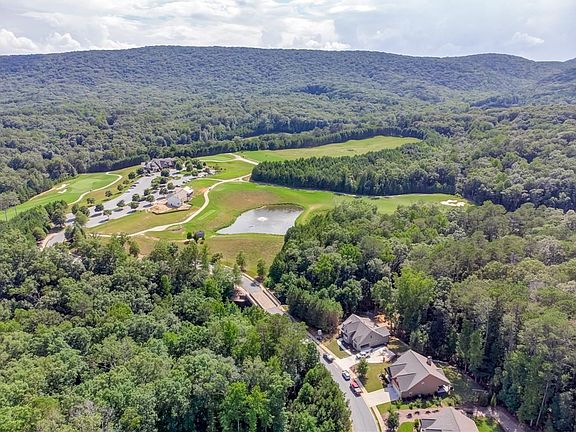 Image 5: House is the 2nd One from the End. Walk to the Clubhouse as Seen Above,