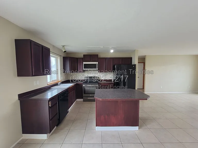 6305 Thistledown Dr — Photo 3