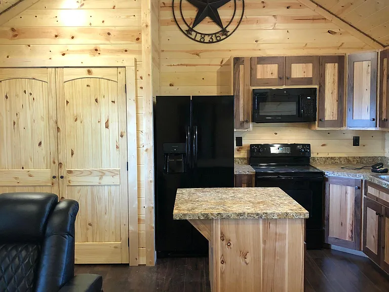 Kitchen. Island bar seats one.