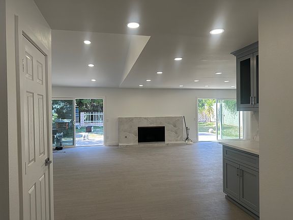 Completely gut renovated. New floors, windows, recessed lighting, paint, doors - everything is brand new.