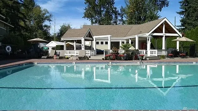 Recreation Area: Large Heated Pool, Hot Tub, and Covered Patio Area