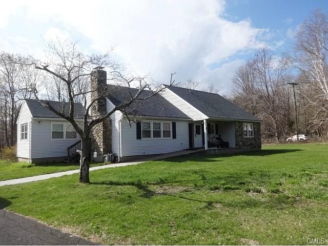 View from wrap-around paved driveway.