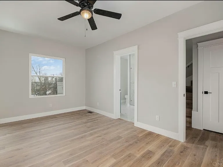 (2nd floor) Master Bedroom view to hallway closet and stairs to 3rd floor