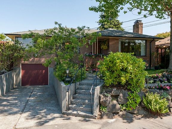 Beautiful 1951 solidly built home awaits a loving new owner! Lively landscaping surrounds this home and you will find wonderful little surprises at every turn in the garden.