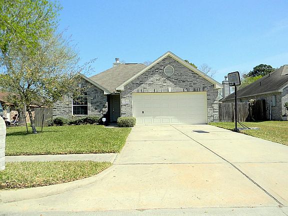 Spacious double wide driveway with 2 car attached garage.