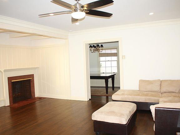 Remote control ceiling fan and recessed lighting in the livi