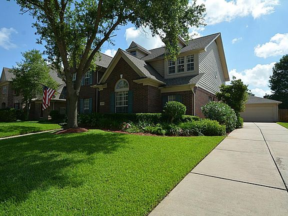 There is a detached garage and extra long driveway. Perfect for parking when entertaining.