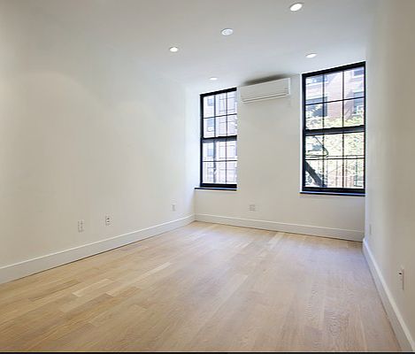 2nd image of 245 E 2nd St APT 3
