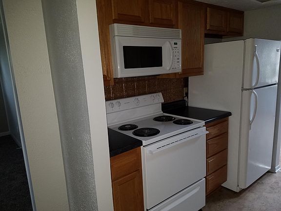 More updated items in Kitchen with new stove and counter tops.